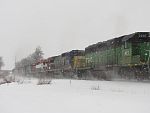 A going away shot of the same train. Showcasing the rainbow of units. Duplainville, WI. February 26th, 2011