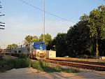 The westbound Empire Builder crosses Duplainville Rd. in the late afternoon. August 15th, 2011