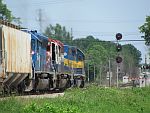 A grain train gets the light to crossover to main 1 as it approaches the Duplainville diamond. June 26th, 2011